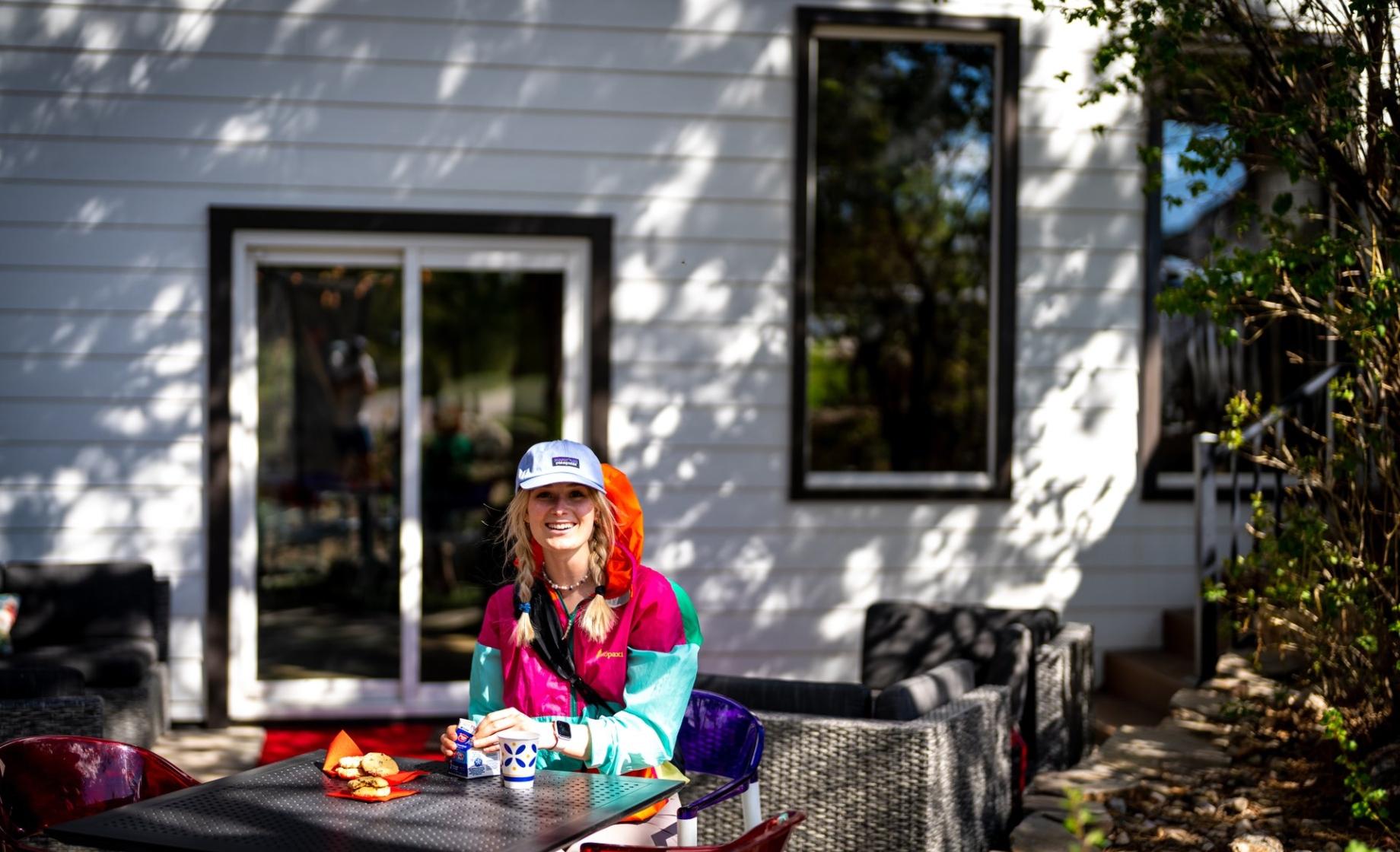 Woman sitting outside the Bavarian Inn in Custer.